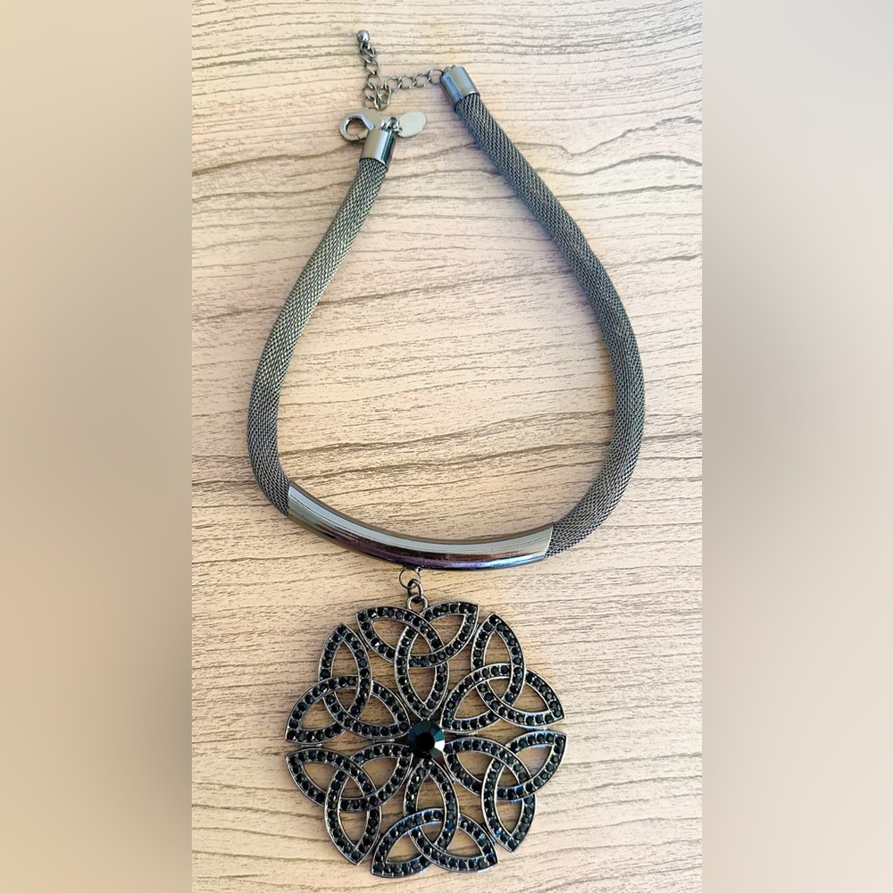 A statement necklace with all crystals intact. Adjustable!